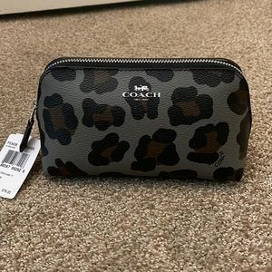 Coach ocelot cosmetic case